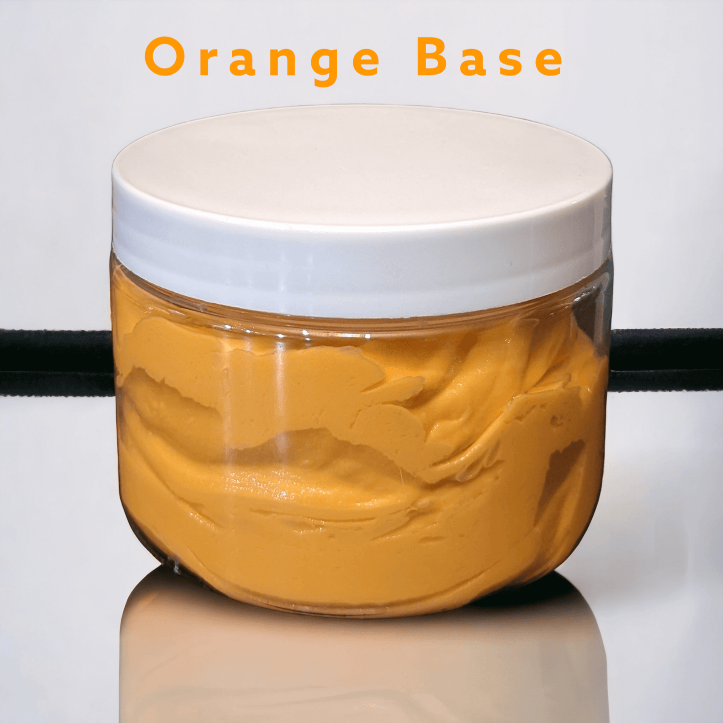 Orange slime in a 12 oz jar