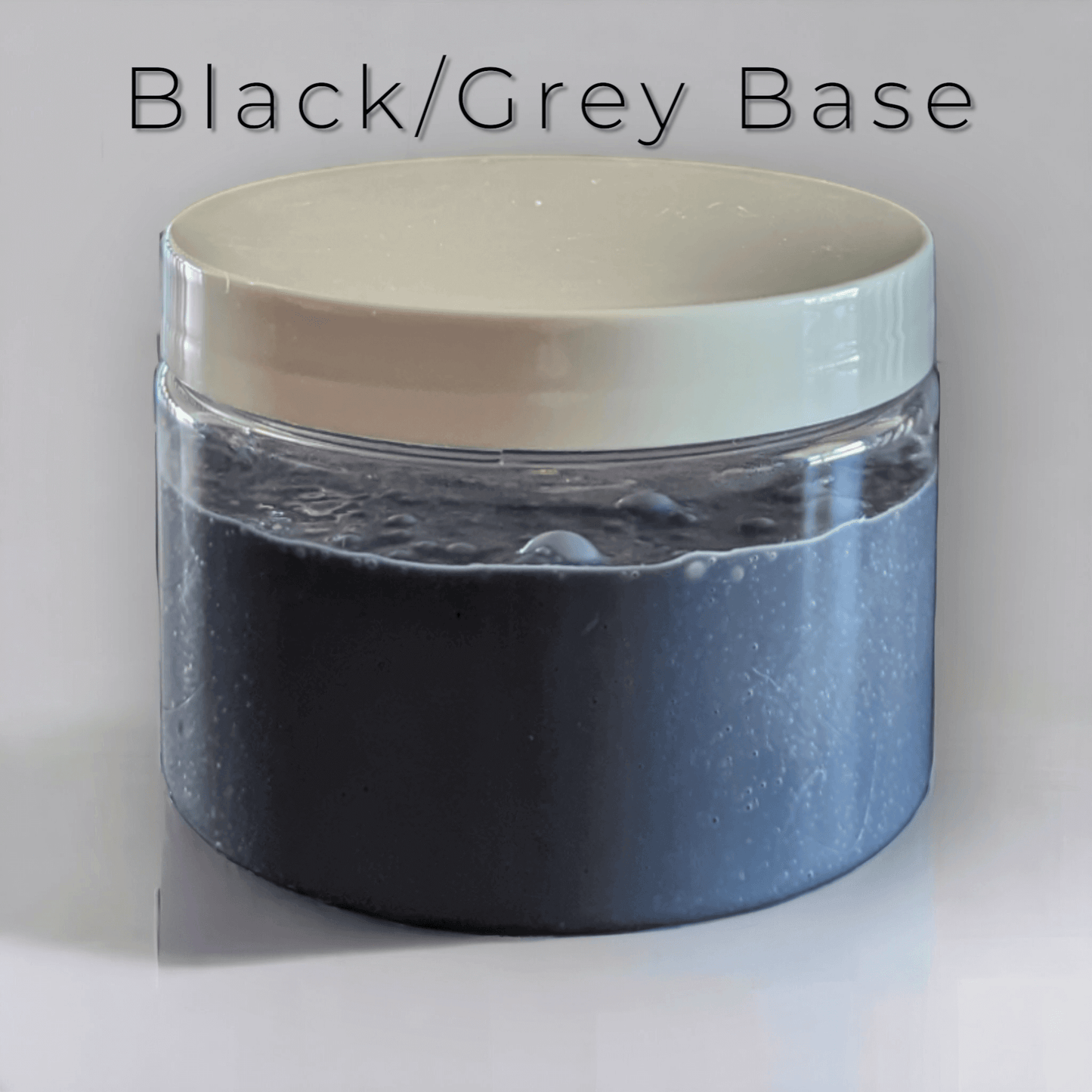 Black/Grey slime in a 12 oz jar